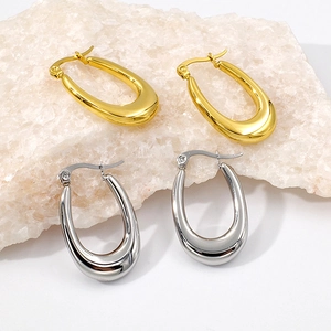 Minimalist U-shaped hollow hoop earrings in gold and silver finish for women