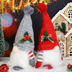 Set of two glowing Christmas gnomes with knitted hats and warm LED lights decor