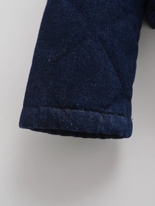Women's dark blue quilted denim jacket with stand collar and button-up cotton-padded sleeves