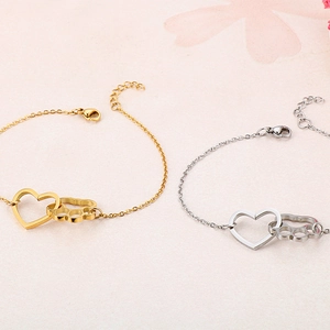 Titanium steel heart and pet paw pendant bracelets in gold and silver finishes