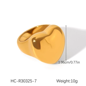 Detailed view of gold-tone heart-shaped ring with size and weight measurements