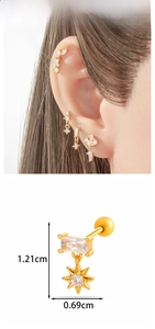 Detail view of gold earrings with rectangular zircon and star charm plus size measurements