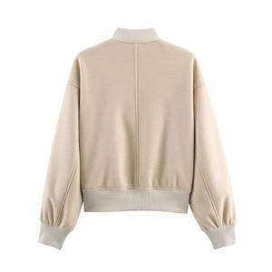 Back view of a beige wool-blend jacket featuring ribbed cuffs and structured seam detail