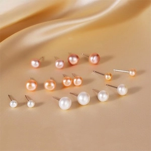 Detailed set of S999 silver pearl studs in white, pink, and purple in multiple sizes