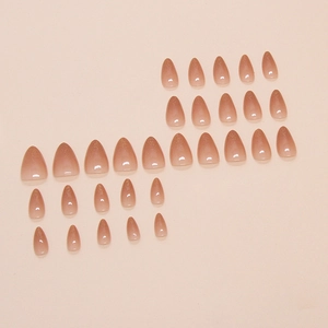 Gradient brown almond press-on nails with fine glitter accents in a 24-piece set