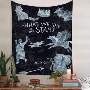Deep blue celestial tapestry with constellations hung above a cozy plant setting