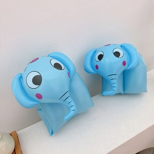 Close-up of blue elephant inflatable arm floats for kids featuring 3D trunk and ears