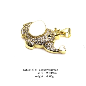 Detail of gold elephant pendant with zircon inlay showing dimensions and copper material