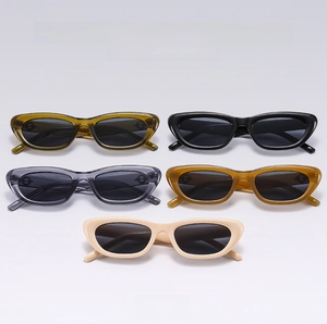 Variety of retro cat eye sunglasses in olive green, black, amber, and beige colors