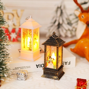 Christmas lanterns with snowman motif on a cozy holiday tabletop display with warm LED light