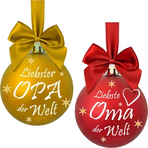 Close-up of gold and red Christmas ornaments with German text for Grandpa and Grandma