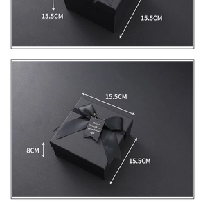 Close-up of black square gift box with ribbon and 15.5x15.5x8cm size annotations