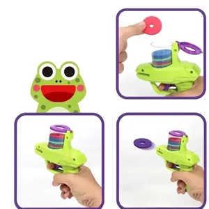 Cartoon frog disc launcher toy set with colorful flying saucers for outdoor play