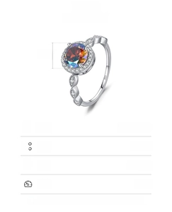 Detail of 925 sterling silver ring with 7mm round iridescent stone and side diamonds