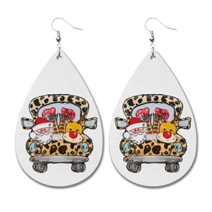 Detail of Christmas faux leather teardrop earrings with festive Santa and leopard truck print