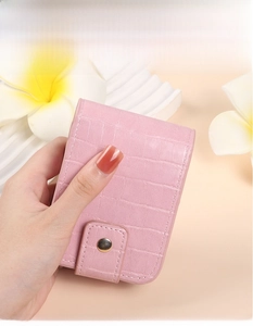 Pink PU leather lipstick case with crocodile pattern and interior mirror detail