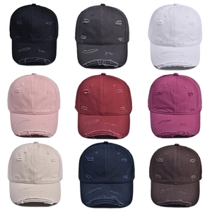 Set of 9 distressed vintage baseball caps in various colors with stylish torn edge details