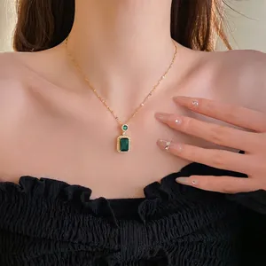 Vintage French emerald rectangular pendant necklace with gold chain and zircon accents