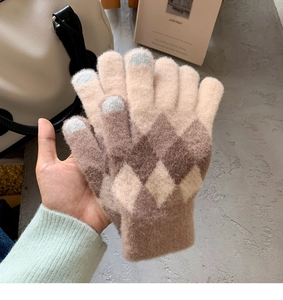 Detailed knit texture of brown argyle wool touch screen gloves for winter warmth
