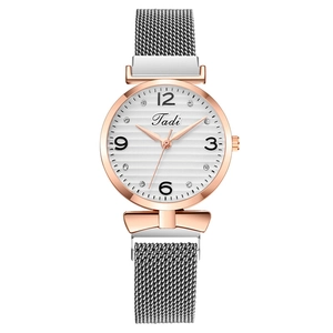 Elegant women's watch with rose gold case, white textured dial and magnetic Milanese strap