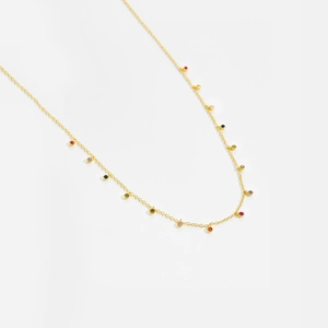 Elegant gold sterling silver choker with colorful zircon beads on a clean white background