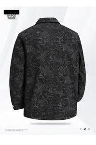 Back view of a black men's jacket featuring dark tropical monstera leaf prints