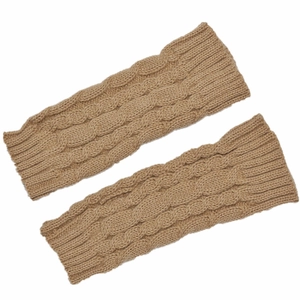 Close-up of camel knit arm warmers showing detailed cable knit patterns and ribbed cuffs