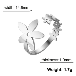 Adjustable silver stainless steel open ring featuring a minimalist cutout floral design