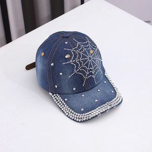 Dark blue denim baseball cap with rhinestone spider web pattern and adjustable strap