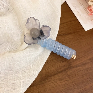 Sweet blue telephone wire hair tie with grey flower, trendy and fresh accessory for women.