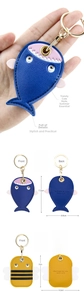 Detail view of mini PU leather shark and bee keychains with size dimensions and engraving