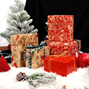 Vintage Christmas kraft wrapping paper with festive red bird and gold patterns for gifts