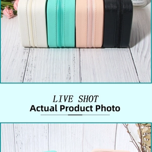 Mini portable PU jewelry box showing colorful cross-grain leather and metal zipper detail