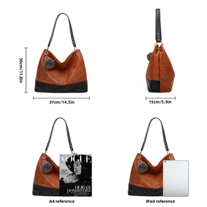 Detail view showing dimensions of contrast tote bag with A4 magazine and iPad comparison