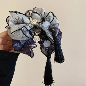Retro Chinese style hair claw clip with bamboo print bow, flower and black tassels