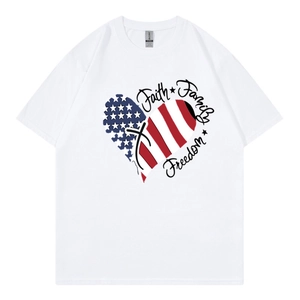 Detail of white cotton T-shirt featuring USA flag heart print and patriotic typography