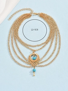 Detail of bohemian gold anklet showing turquoise beads and 22+5CM size labeling