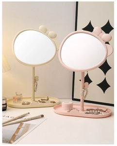 Close-up of cute cat-ear makeup mirrors with integrated jewelry storage base tray