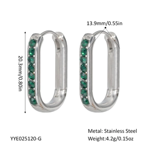 Detailed view of silver stainless steel U-shaped earrings with green stones and dimensions