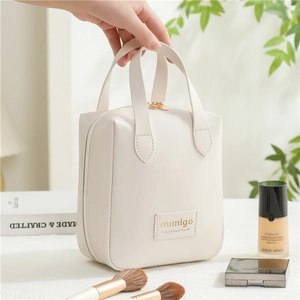 Creamy white PU shell makeup bag with double handles for travel storage