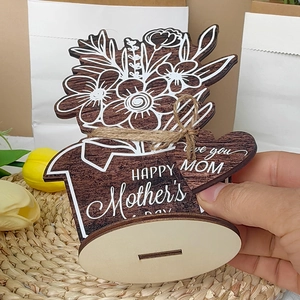 Detail of wooden Mother's Day flower ornament with Happy Mother's Day engraving