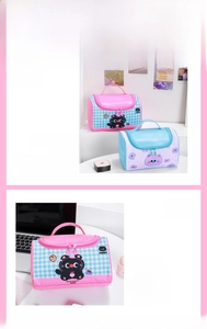 Detail of vibrant checkered toiletry bags with cute cat and panda prints and top handles