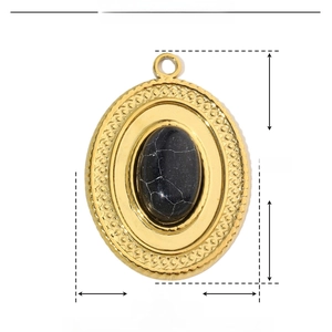 Detail view of the gold stainless steel teardrop pendant with dimensions 28mm by 20mm