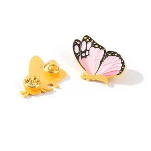 Pink and black enamel butterfly brooch with gold metal finish and double pin clutch