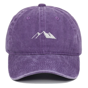 Close-up of white mountain embroidery on vintage washed purple cotton baseball cap