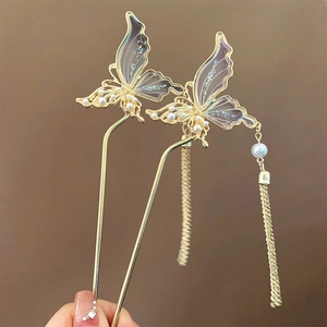 Épingle à cheveux papillon évidée avec ailes lavande et pendentif à pompon doré