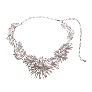 Silver coral-shaped metal bib necklace with faux pearls on white background