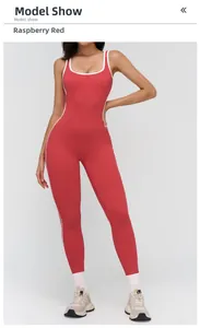 Detail of raspberry red yoga bodysuit with white contrast piping and slim-fit cut