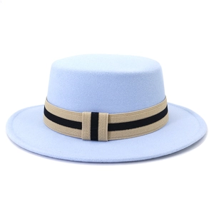 Detail of light blue wool boater hat featuring a khaki and black striped decorative band