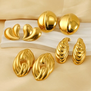 Collection of four 18k gold plated stainless steel stud earrings in heart and oval shapes